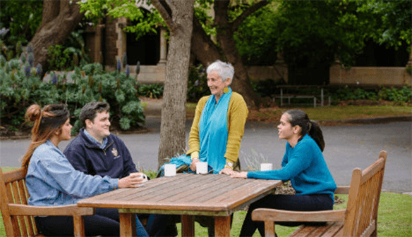 indigenous students and staff engaged in conversation on the °Ŀ grounds